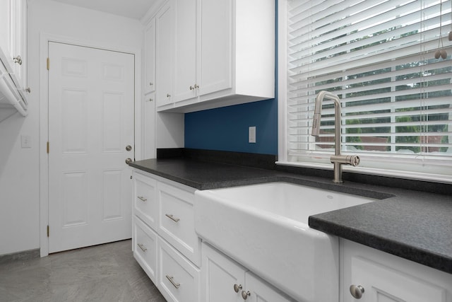 3351 Oak Burr Dr, Chattanooga, TN 37419 - kitchen featuring dark countertops and white cabinetry
