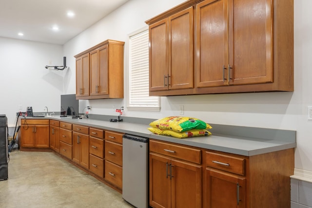 3351 Oak Burr Dr, Chattanooga, TN 37419 - kitchen featuring fridge, brown cabinetry, recessed lighting, and light countertops
