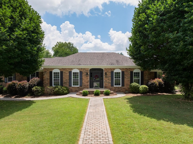 3351 Oak Burr Dr, Chattanooga, TN 37419 - ranch-style home featuring a front yard, brick siding, and a shingled roof