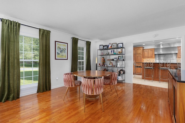 3351 Oak Burr Dr, Chattanooga, TN 37419 - dining space with light wood-type flooring and ornamental molding