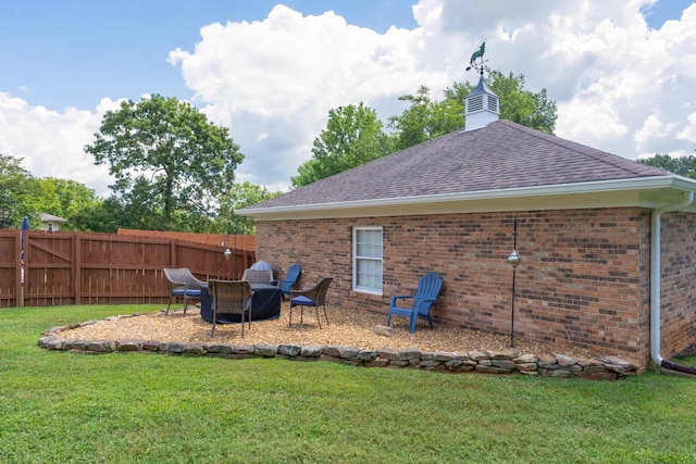 3351 Oak Burr Dr, Chattanooga, TN 37419 - back of property with a shingled roof, brick siding, a chimney, and a patio area
