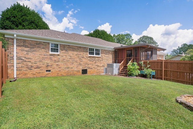 3351 Oak Burr Dr, Chattanooga, TN 37419 - rear view of house with a sunroom, crawl space, brick siding, and roof with shingles