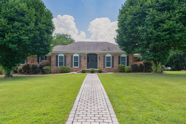 3351 Oak Burr Dr, Chattanooga, TN 37419 - view of front facade with a front lawn and brick siding