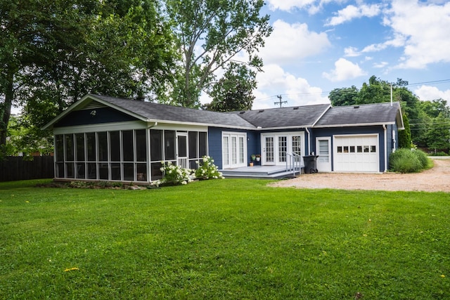 818 W Clark Blvd, Murfreesboro, TN 37129 - back of house with french doors, a garage, dirt driveway, a sunroom, and a lawn