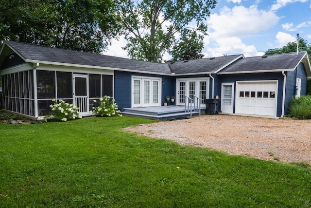 818 W Clark Blvd, Murfreesboro, TN 37129 - back of property with french doors, a garage, dirt driveway, a wooden deck, and a sunroom