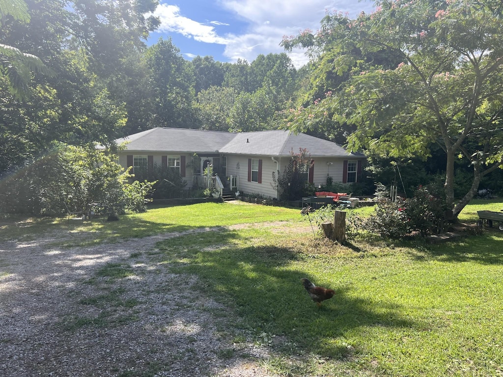 5569 Parker Branch Rd, Franklin, TN 37064 - view of front facade with a front lawn