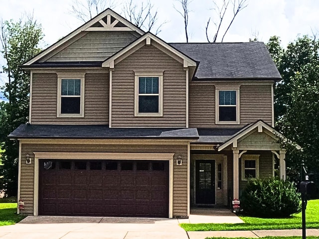 152 Dueler Dr, Hermitage, TN 37076 - craftsman house featuring an attached garage, driveway, a porch, and a shingled roof