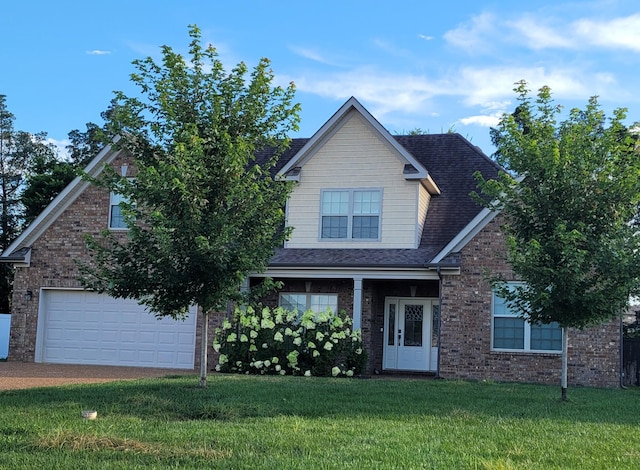 1142 Remuda Cir, Smyrna, TN 37167 - view of front of house with a front lawn, brick siding, and roof with shingles