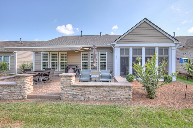154 Salient Ln, Mount Juliet, TN 37122 - rear view of property with a patio area and roof with shingles