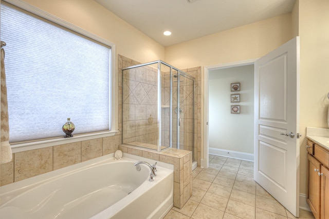 154 Salient Ln, Mount Juliet, TN 37122 - bathroom featuring vanity, a garden tub, a shower stall, tile patterned floors, and recessed lighting