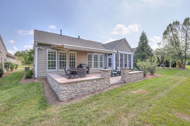 154 Salient Ln, Mount Juliet, TN 37122 - rear view of house with a patio area, a yard, and roof with shingles