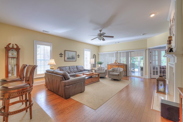 154 Salient Ln, Mount Juliet, TN 37122 - living room with a ceiling fan, hardwood / wood-style floors, a fireplace, and recessed lighting