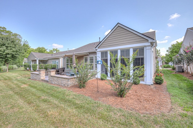 154 Salient Ln, Mount Juliet, TN 37122 - back of house with a patio area, a yard, and a shingled roof