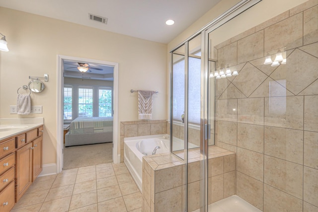 154 Salient Ln, Mount Juliet, TN 37122 - ensuite bathroom featuring vanity, a bath, tile patterned flooring, a ceiling fan, and a shower stall