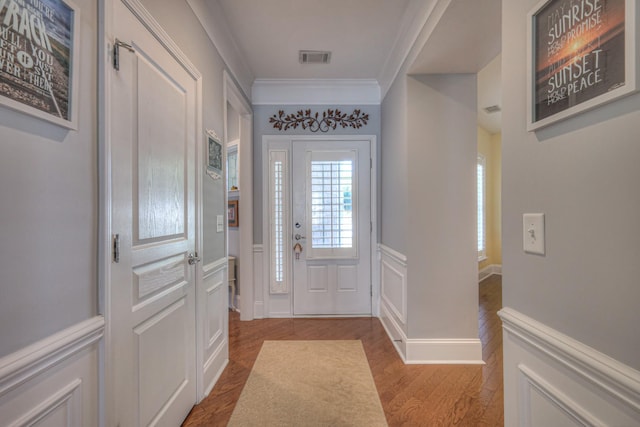154 Salient Ln, Mount Juliet, TN 37122 - entryway featuring wood finished floors, ornamental molding, a decorative wall, and wainscoting