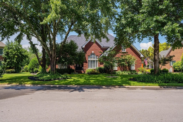 1515 Bradberry Dr, Murfreesboro, TN 37130 - view of front of house with brick siding and a front lawn