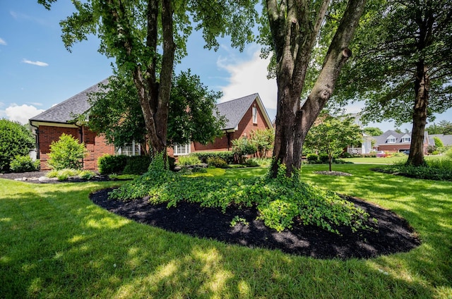 1515 Bradberry Dr, Murfreesboro, TN 37130 - view of front facade with brick siding and a front lawn