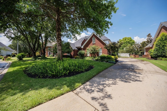 1515 Bradberry Dr, Murfreesboro, TN 37130 - view of front of property with driveway, a front yard, and brick siding