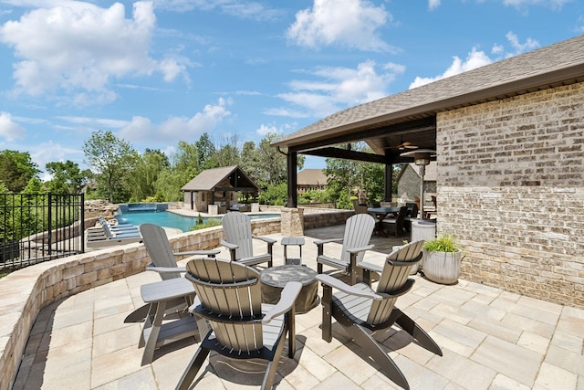 1300 Stovall Ln, Mount Juliet, TN 37122 - view of patio with a gazebo, ceiling fan, a fire pit, and an outdoor hot tub