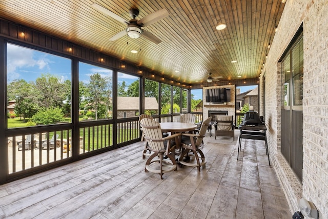 1300 Stovall Ln, Mount Juliet, TN 37122 - sunroom / solarium featuring ceiling fan, outdoor dining area, and an outdoor stone fireplace