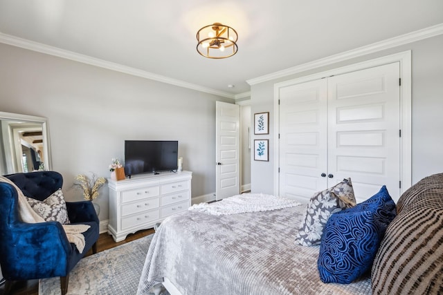 1300 Stovall Ln, Mount Juliet, TN 37122 - bedroom featuring crown molding, wood finished floors, and a closet