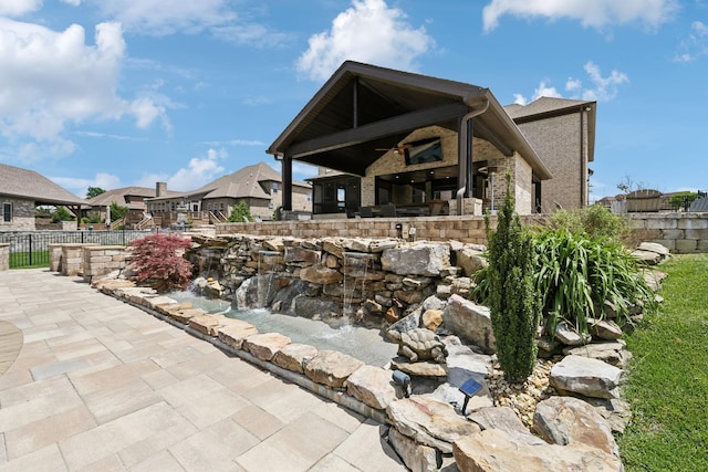 1300 Stovall Ln, Mount Juliet, TN 37122 - view of patio / terrace with a small pond