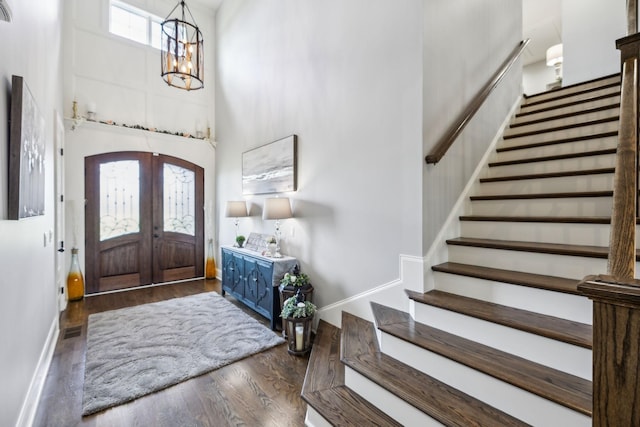 1300 Stovall Ln, Mount Juliet, TN 37122 - foyer with stairway, a high ceiling, wood finished floors, a chandelier, and french doors