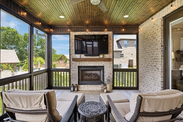 1300 Stovall Ln, Mount Juliet, TN 37122 - sunroom / solarium featuring an outdoor brick fireplace and a ceiling fan