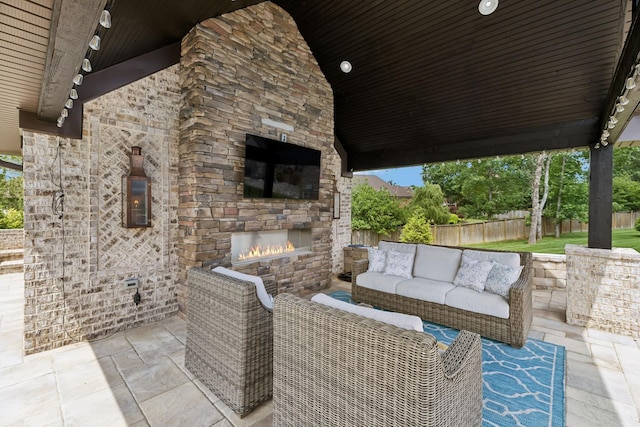 1300 Stovall Ln, Mount Juliet, TN 37122 - view of patio with an outdoor living space with a fireplace