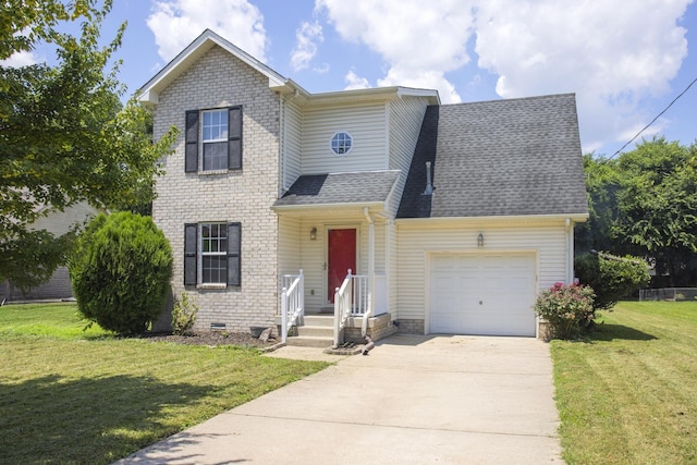 732 Charlie Gann Rd, Old Hickory, TN 37138 - traditional home featuring concrete driveway, a front yard, a shingled roof, and a garage