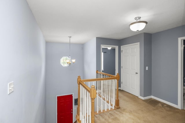 732 Charlie Gann Rd, Old Hickory, TN 37138 - hall with an upstairs landing, a chandelier, and carpet flooring