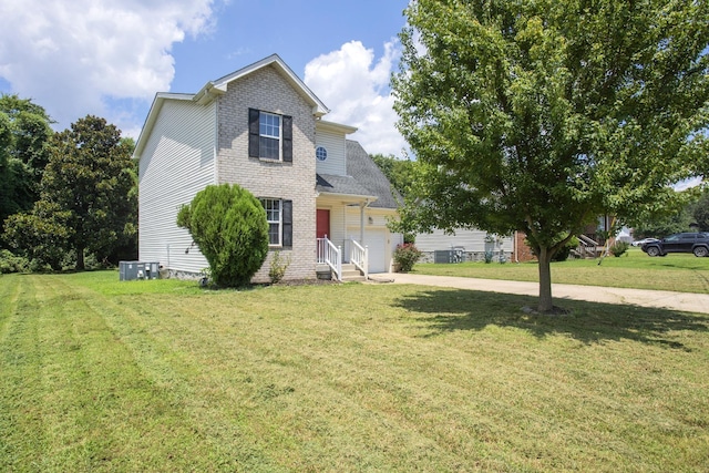 732 Charlie Gann Rd, Old Hickory, TN 37138 - traditional-style house featuring driveway, a front yard, brick siding, and an attached garage