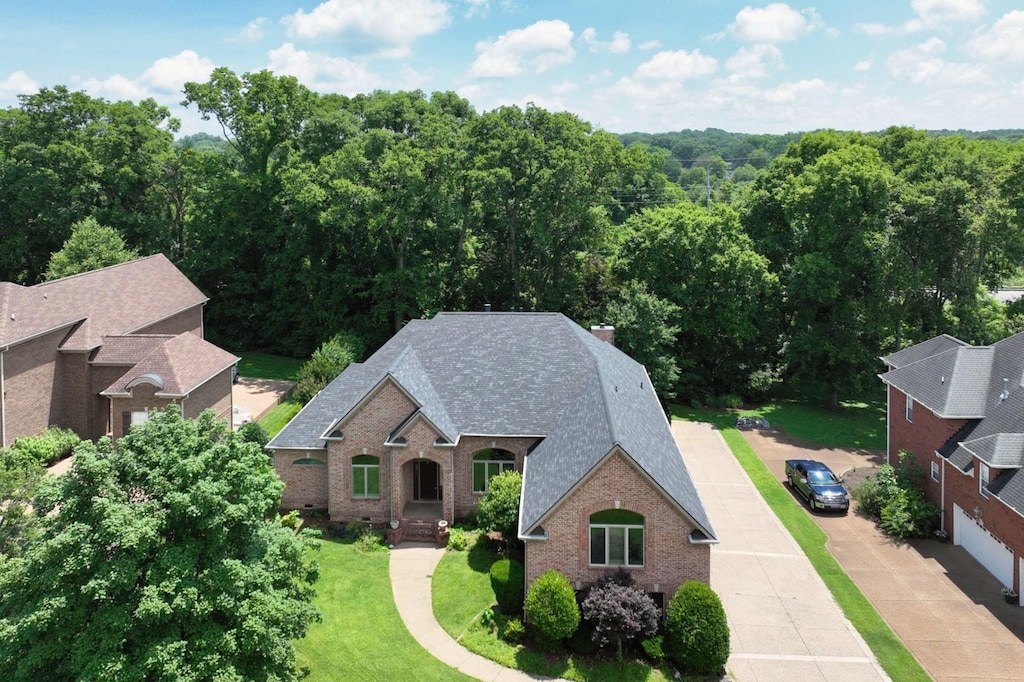 1440 Station Four Ln, Old Hickory, TN 37138 - view of subject property with a heavily wooded area