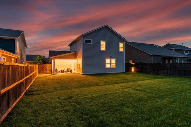 1013 Violet St, Spring Hill, TN 37174 - back of property at dusk with a fenced backyard
