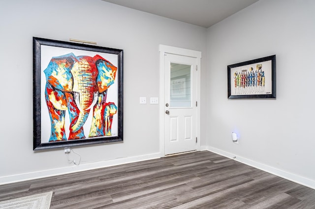 1013 Violet St, Spring Hill, TN 37174 - foyer featuring dark wood-style floors and baseboards
