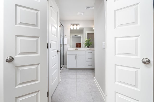 1013 Violet St, Spring Hill, TN 37174 - full bath featuring vanity, a shower stall, and tile patterned floors