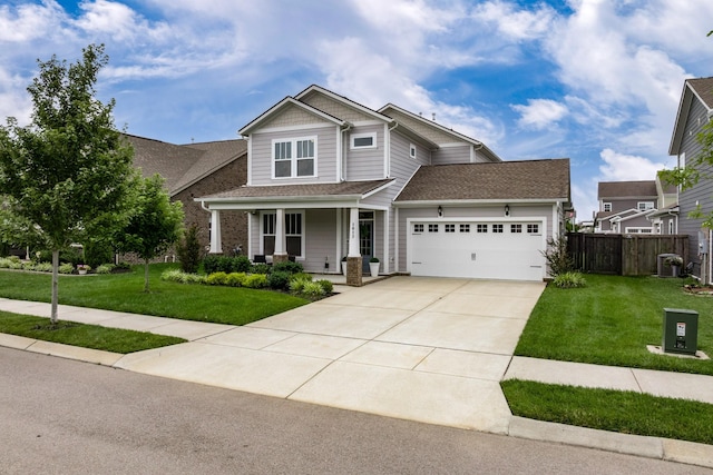 1013 Violet St, Spring Hill, TN 37174 - craftsman inspired home with a porch, an attached garage, driveway, and roof with shingles