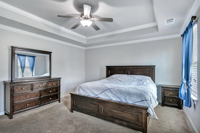 4905 Kingdom Dr, Murfreesboro, TN 37128 - carpeted bedroom with a raised ceiling, multiple windows, a ceiling fan, and crown molding