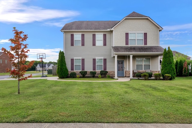4905 Kingdom Dr, Murfreesboro, TN 37128 - view of front facade featuring stone siding, a front yard, and a shingled roof