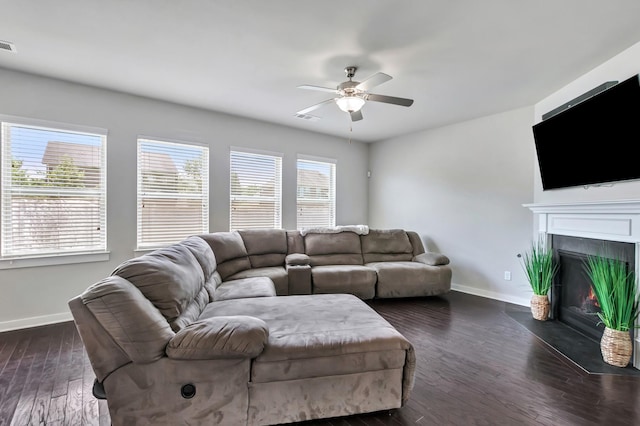 4905 Kingdom Dr, Murfreesboro, TN 37128 - living room featuring healthy amount of natural light, a ceiling fan, a fireplace with flush hearth, and dark wood-style flooring