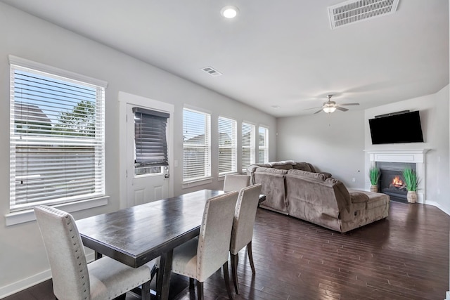 4905 Kingdom Dr, Murfreesboro, TN 37128 - dining area featuring a ceiling fan, dark wood-style flooring, a glass covered fireplace, and recessed lighting