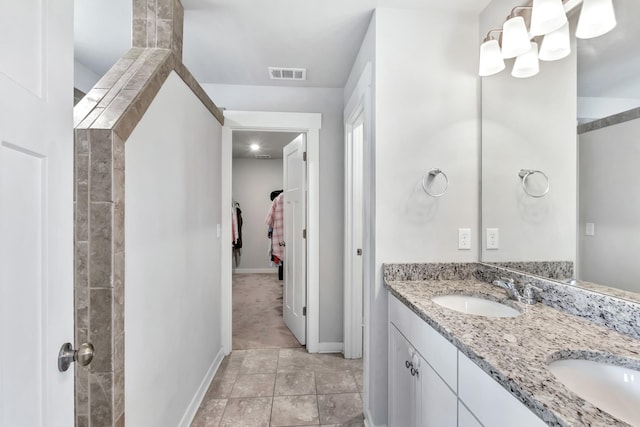 4905 Kingdom Dr, Murfreesboro, TN 37128 - bathroom featuring double vanity and baseboards
