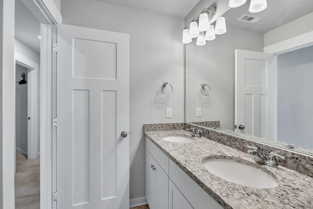 4905 Kingdom Dr, Murfreesboro, TN 37128 - bathroom with double vanity and baseboards