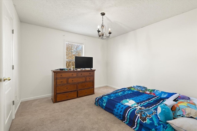 2720 Buckner Rd, Thompsons Station, TN 37179 - bedroom featuring a chandelier, carpet floors, and a textured ceiling