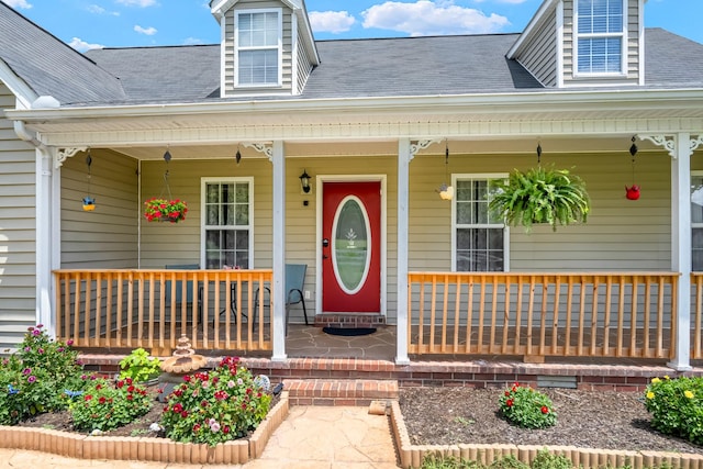 2720 Buckner Rd, Thompsons Station, TN 37179 - entrance to property featuring covered porch and roof with shingles