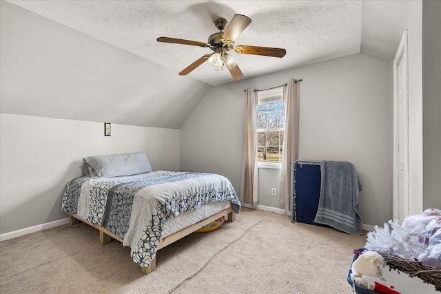 2720 Buckner Rd, Thompsons Station, TN 37179 - carpeted bedroom featuring vaulted ceiling, a ceiling fan, and a textured ceiling