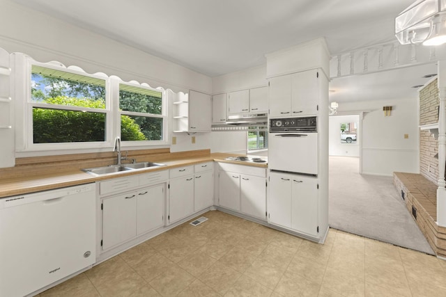 307 Mary Sharp Dr, Decherd, TN 37324 - kitchen with white appliances, light countertops, open shelves, white cabinetry, and light colored carpet