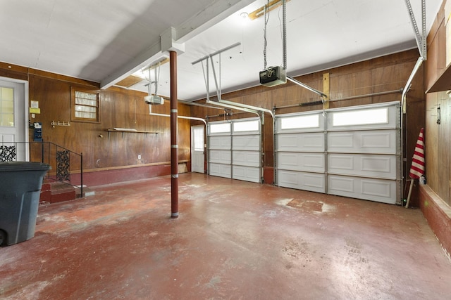 307 Mary Sharp Dr, Decherd, TN 37324 - garage with wooden walls and a garage door opener