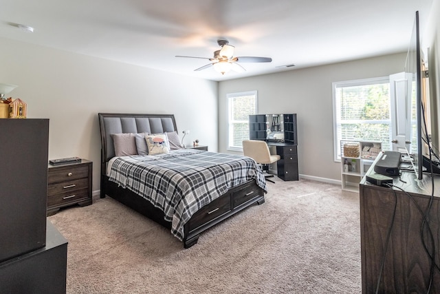 135 Millers Ln, Calhoun, GA 30701 - bedroom with multiple windows, a desk, light carpet, and ceiling fan