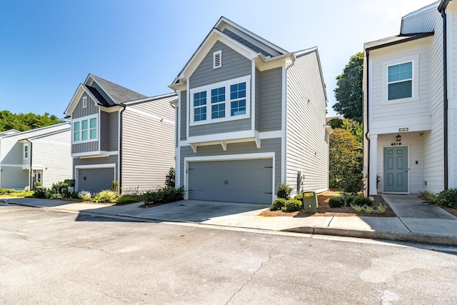 135 Millers Ln, Calhoun, GA 30701 - view of front of home with an attached garage and driveway